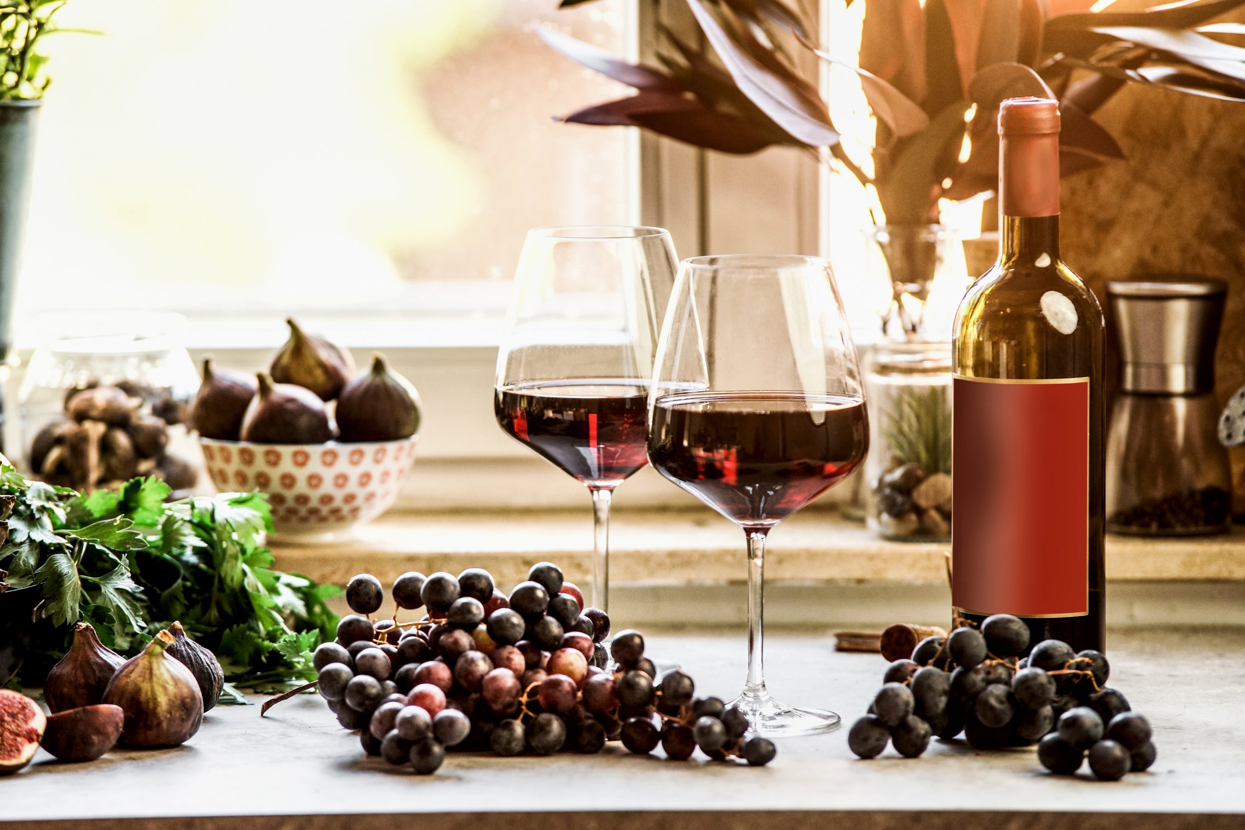 red-wineglasses-with-grapes-and-wine-bottle-at-kit-2024-02-29-02-37-01-utc